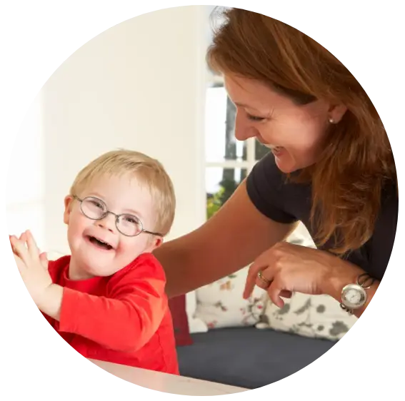 Downs Syndrome boyhaving speech therapy